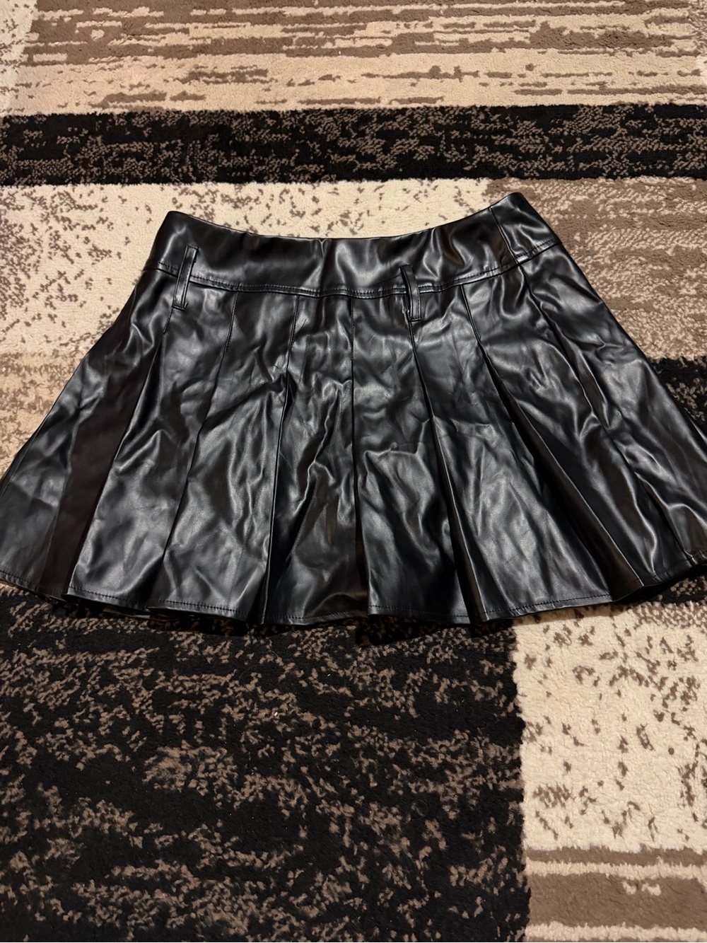 Women’s black faux leather mini skirt with built in shorts